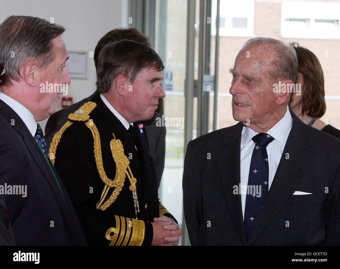 The Duke of Edinburgh (right) meets delegates as he and Britain's Queen Elizabeth II officially open one of the UK's top military buildings - Permanent Joint Headquarters - in Northwood, West London. Stock Photo