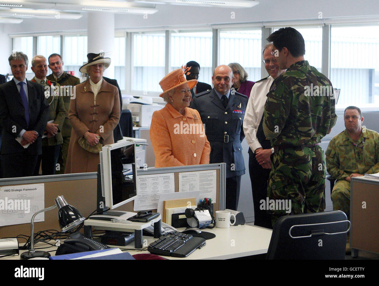 Britain's Queen Elizabeth II meets delegates as she officially open one of the UK's top military buildings - the Permanent Joint Headquarters - in Northwood, West London. Stock Photo