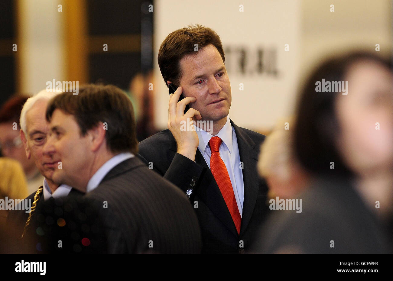 Liberal Democrat party leader Nick Clegg speaks on his mobile phone whilst awaiting the results at Ponds Forge sports centre, Sheffield. Stock Photo