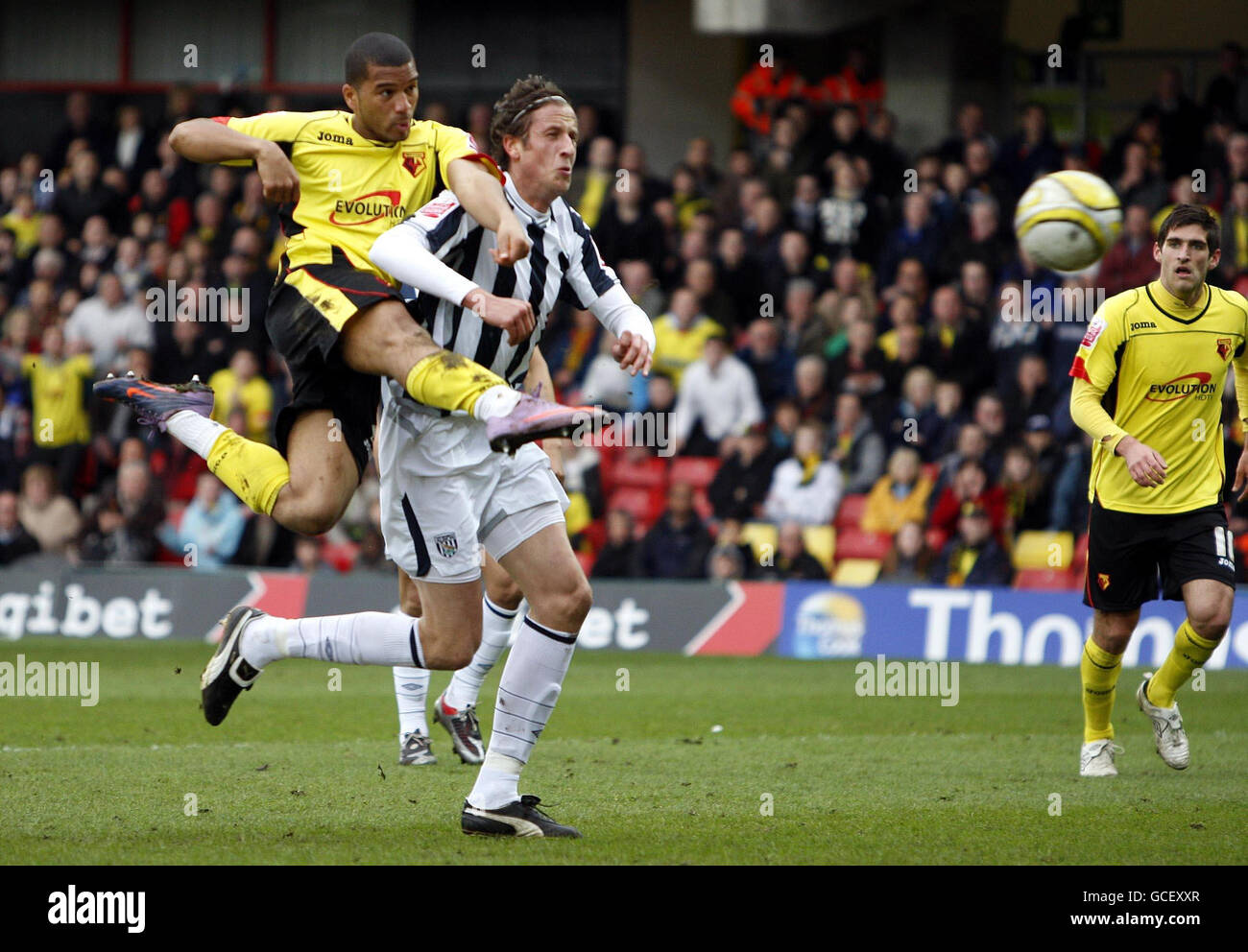 Soccer - Coca-Cola Football League Championship - Watford v West Bromwich Albion - Vicarage Road Stadium. Watfords Adrian Mariappa (left) has a shoot on goal during the Coca-Cola Football League Championship match at Vicarage Road, Watford. Stock Photo