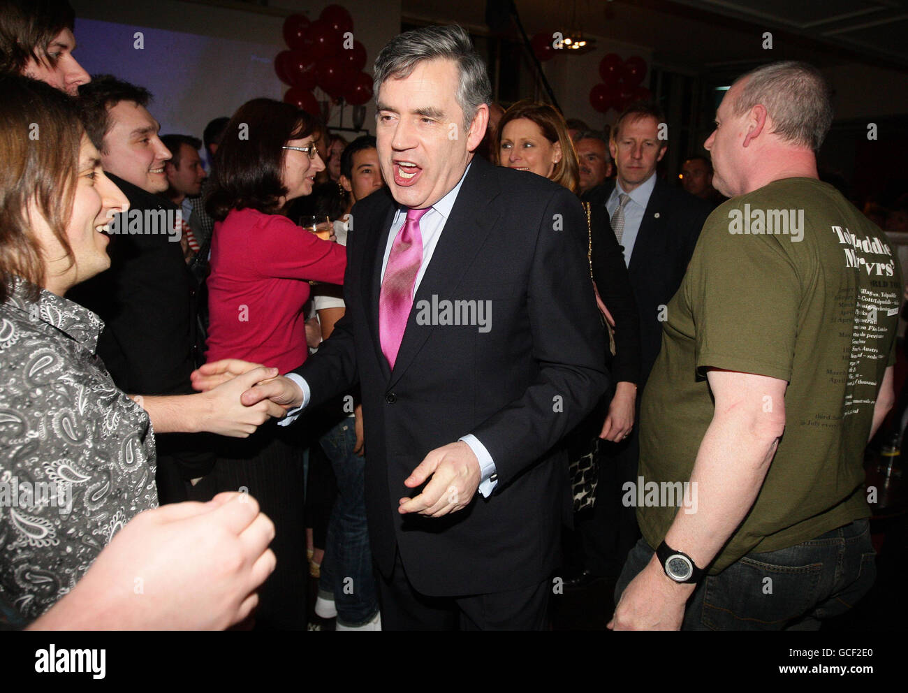 Prime Minister Gordon Brown meets Labour supporters as he arrives at the Kitty O'Shea pub in Manchester, following the live Election Debate between the party leaders. Stock Photo