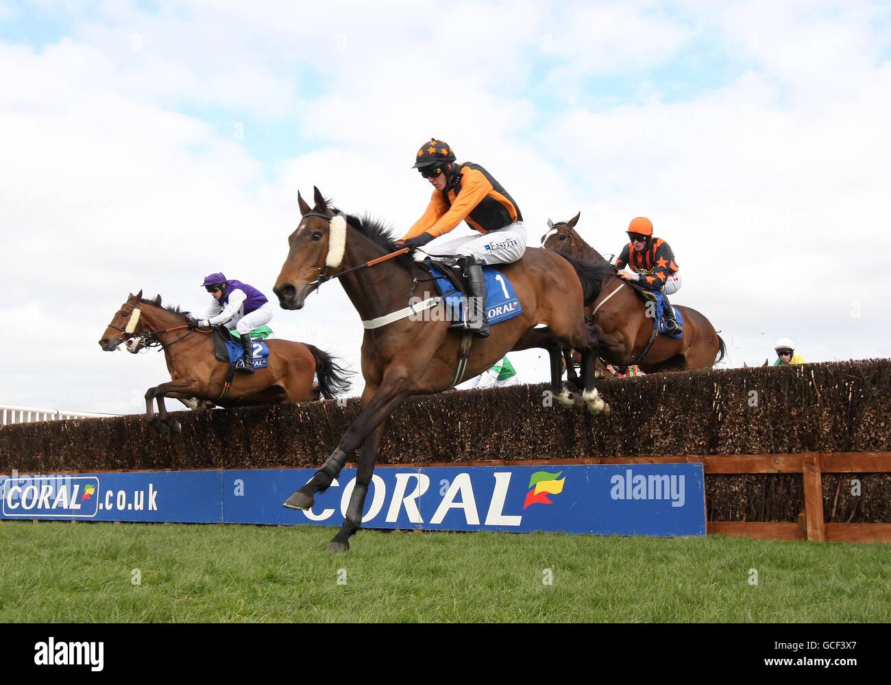 Killyglen ridden by Andrew McNamara (centre) during The Coral Scottish Grand National Handicap Steeple Chase during the Coral Scottish Grand National Festival at Ayr Racecourse, Ayr. Stock Photo