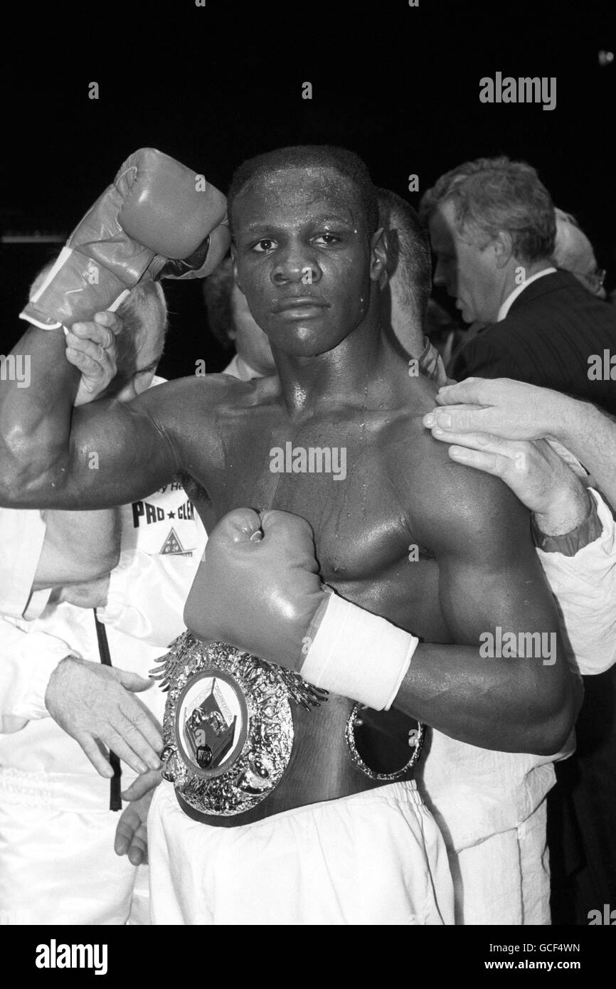Chris Eubank raises a glove in celebration after beating Gary Stretch on a technical knockout Stock Photo