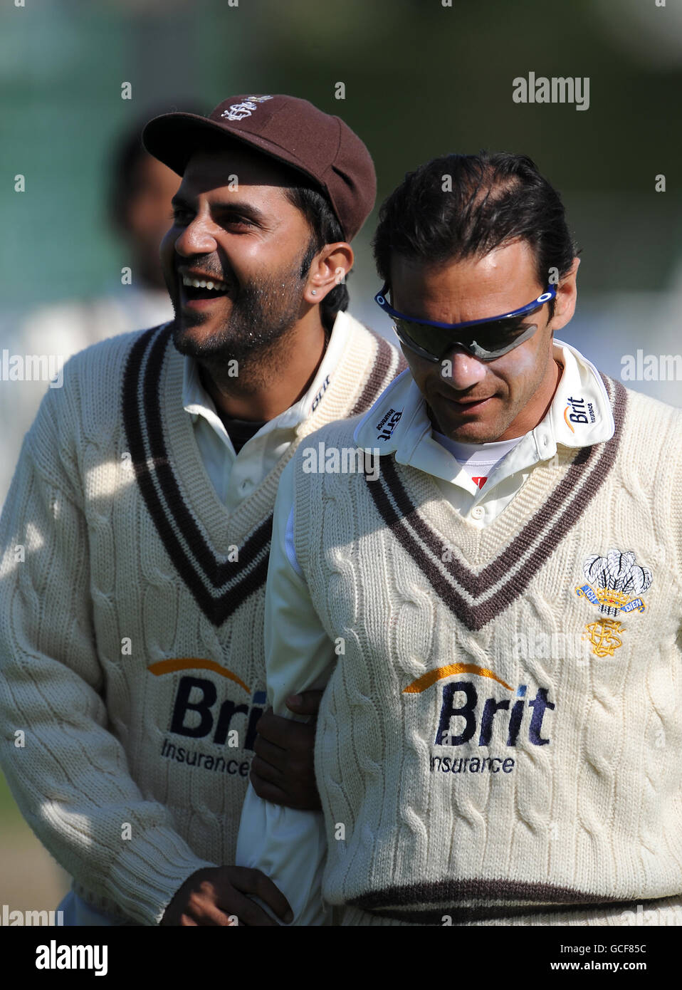 Surrey's Usman Afzaal (left) and Mark Ramprakash share a joke Stock Photo