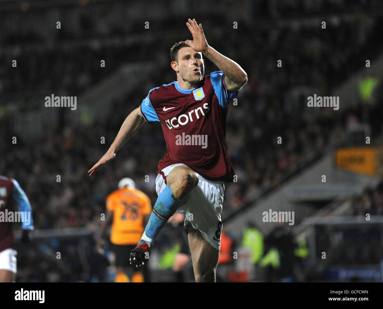 Aston Villa's James Milner celebrates scoring their second goal of the game during the Barclays Premier League match at the KC Stadium, Hull. Stock Photo