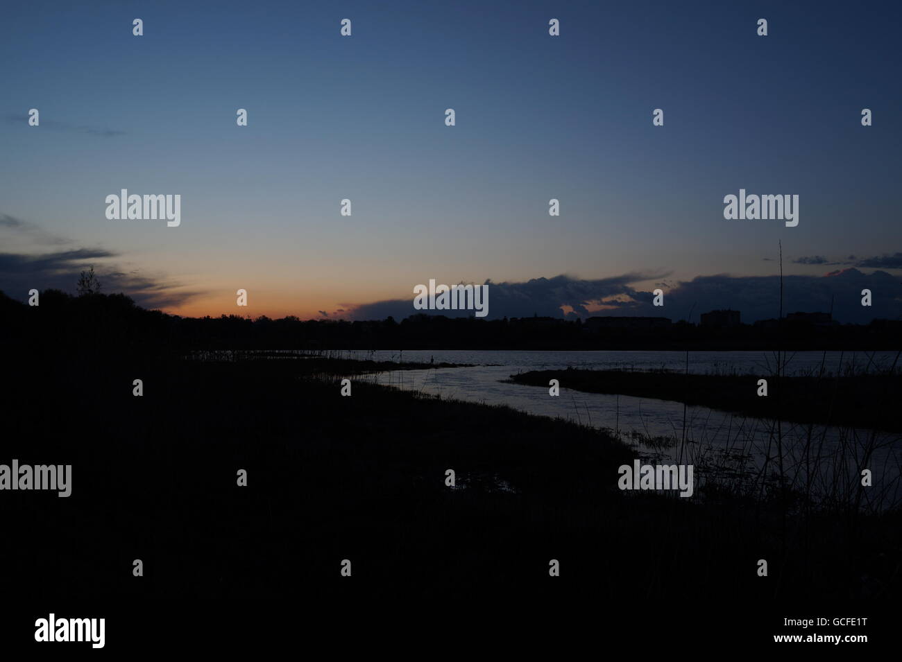 sunset on the river Stock Photo - Alamy