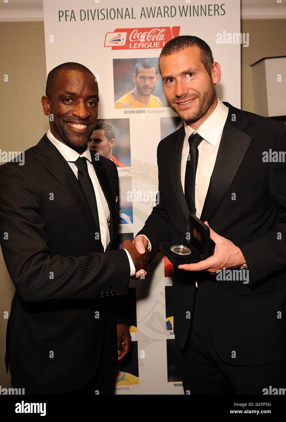 Southampton goalkeeper Kelvin Davis (right) recieves his PFA League One Team of the Year award from PFA Chairman Chris Powell, at the PFA Player of the Year Awards 2010 at the Grosvenor House Hotel, London. Stock Photo