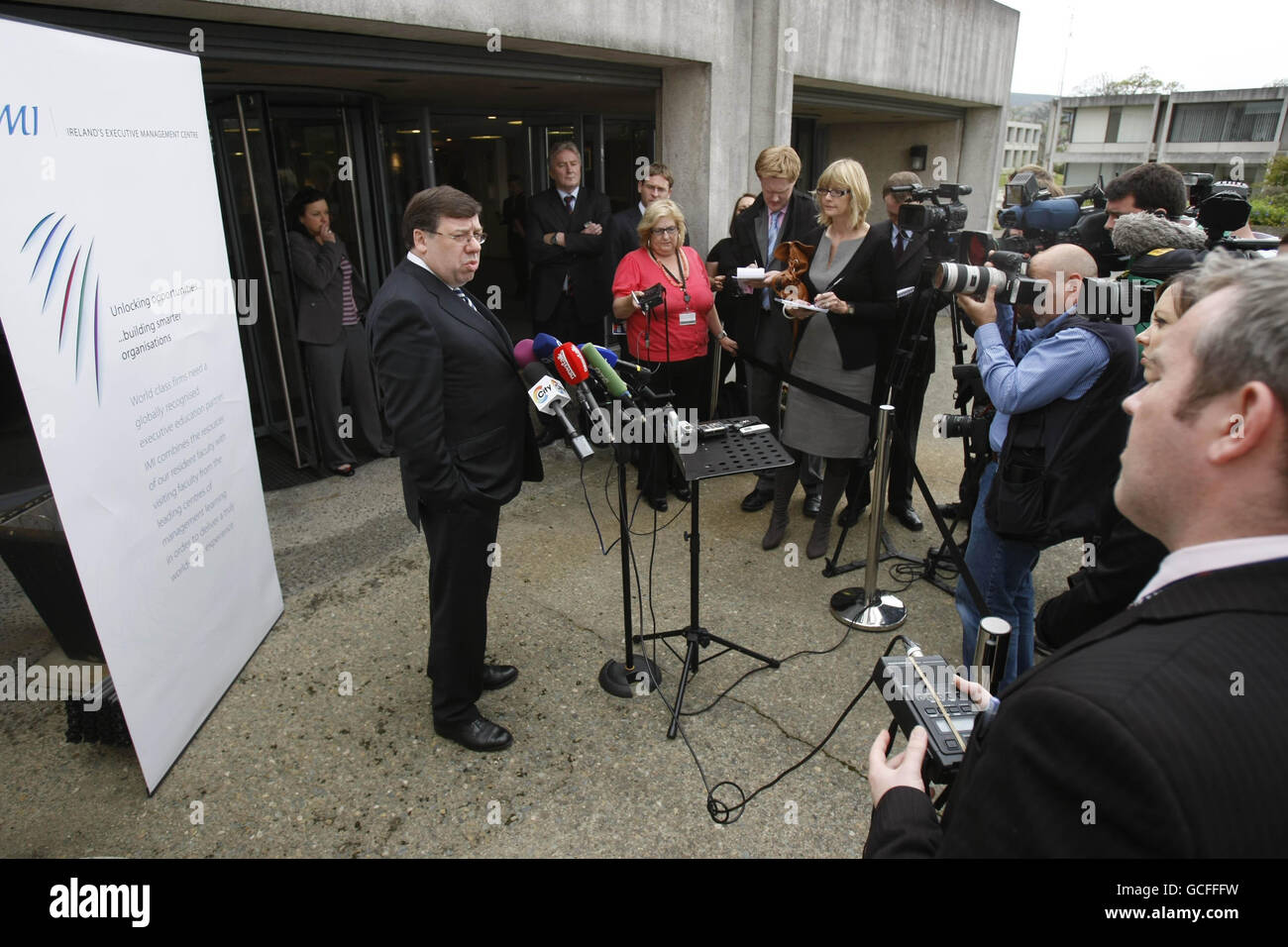 Taoiseach Brian Cowen talking to the media before a backdrop fell on him outside the Irish Management Institute in Dublin his afternoon. Stock Photo