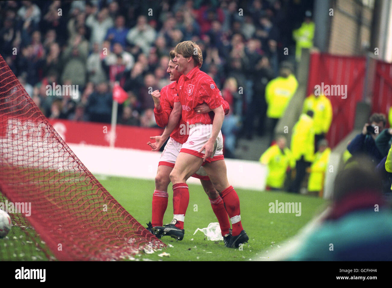Nottingham Forest's Stuart Pearce celebrates with team-mate Gary Bull after scoring against Bolton Wanderers. Stock Photo