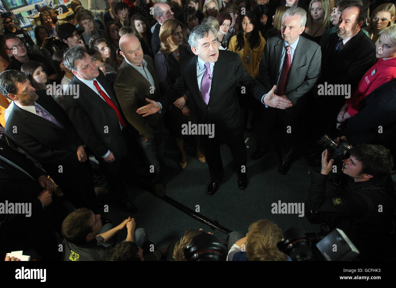 Prime Minister Gordon Brown is joined by his wife Sarah, Schools secretary Ed Balls (second left) and Ross Kemp (third left) as he speaks to students at Warwickshire College in Leamington Spa, during a day of General Election campaigning across the country. Stock Photo