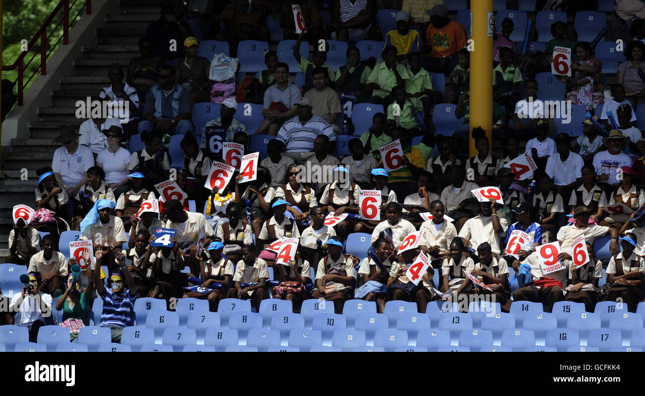 Local schoolchildren watch the match between South Africa and Pakistan in the stands during the Super Eights match at Beausejour Stadium, St Lucia. Stock Photo