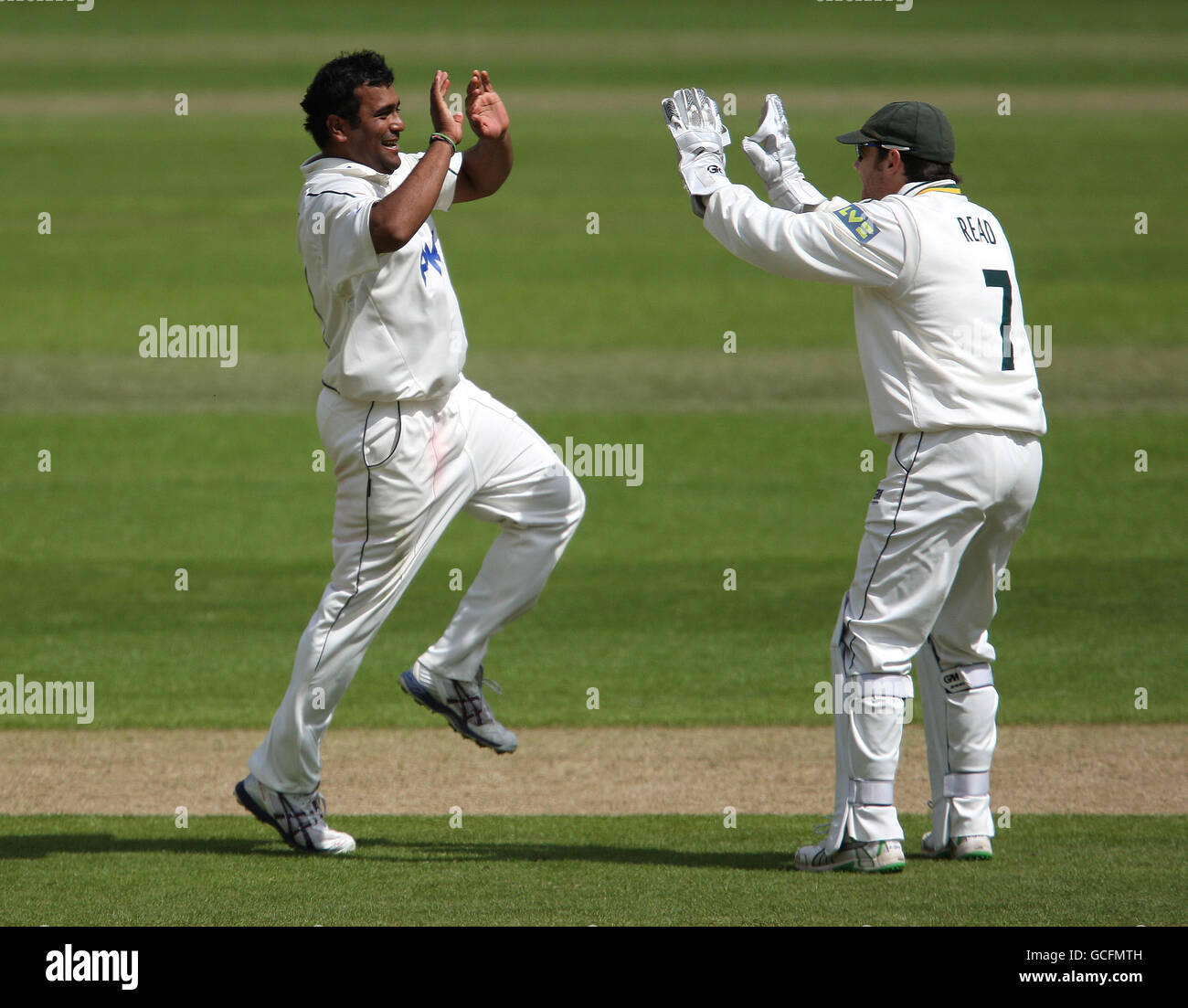 Nottinghamshire's Samit Patel celebrates with Chris Read after the wicket of Durham's Liam Plunkett Stock Photo