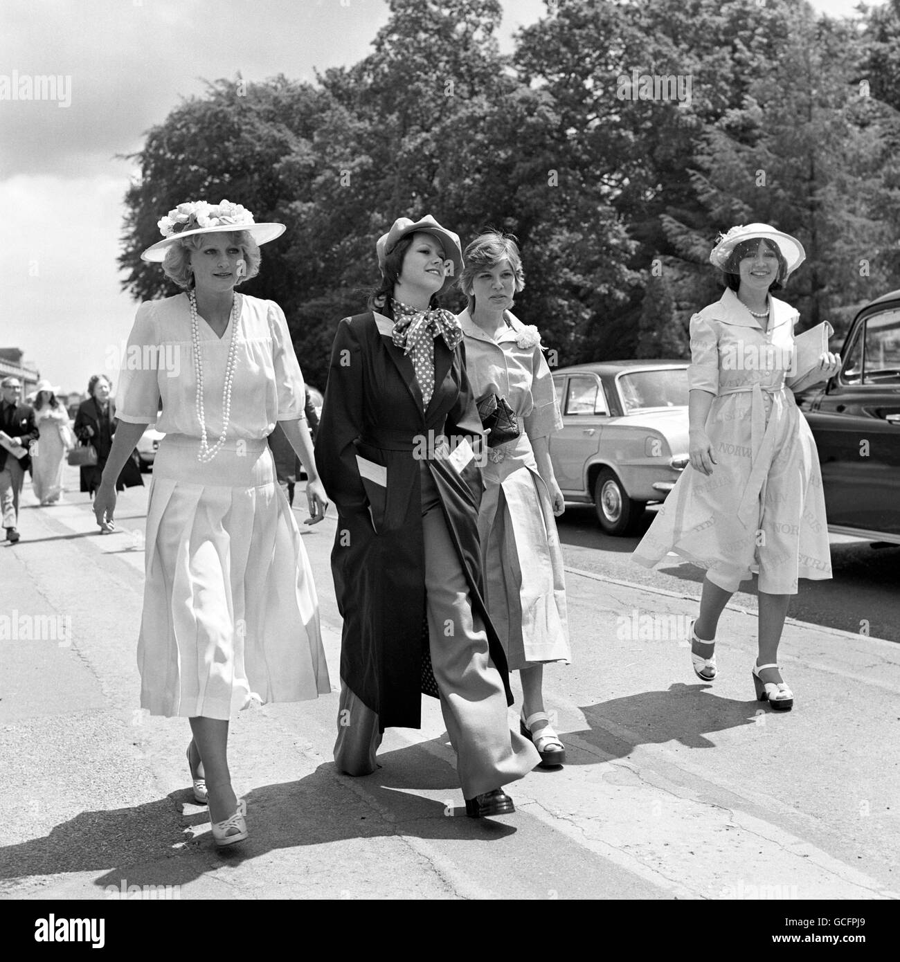 Four girls wearing the 1920s style clothes, inspired by the film 'The Great Gatsby'. The 'Gatsby' style was very prominent at the Royal Ascot race meeting. Stock Photo