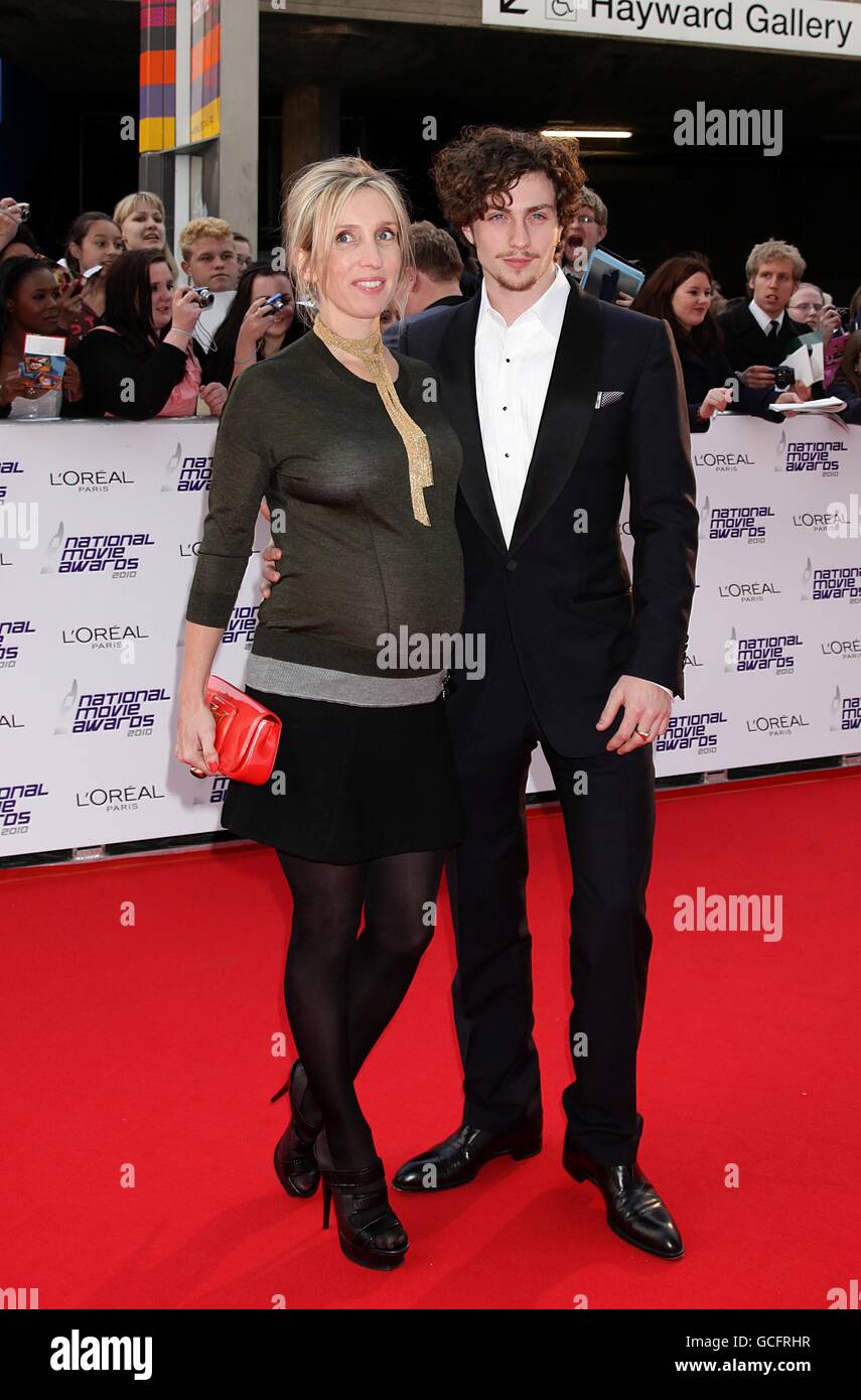 Sam Taylor-Wood and Aaron Johnson arriving for the 2010 National Movie Awards at the Royal Festival Hall, London. Stock Photo