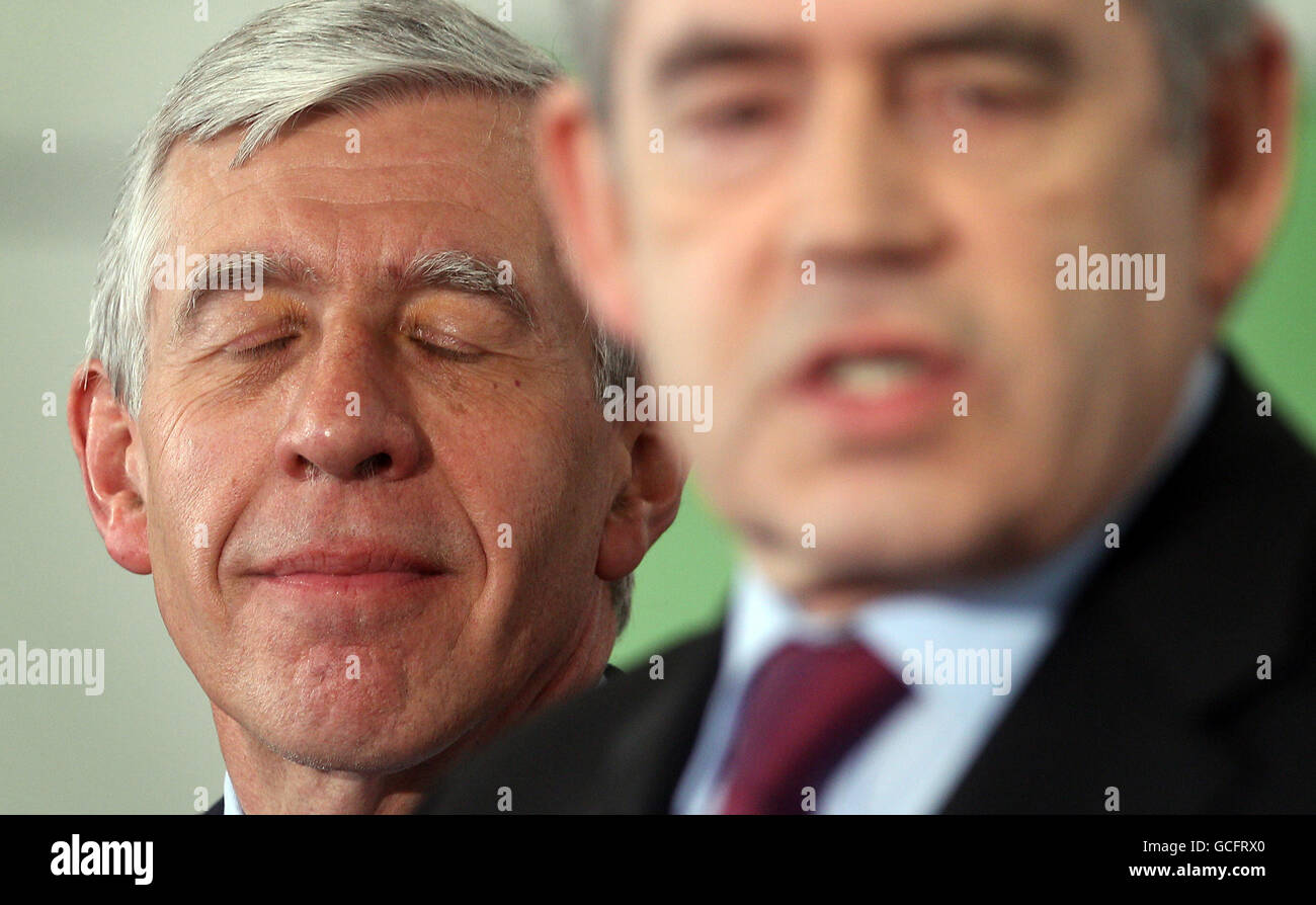 Jack Straw listens to Prime Minister Gordon Brown as he visits a Honeywell Community Centre in Oldham. Stock Photo