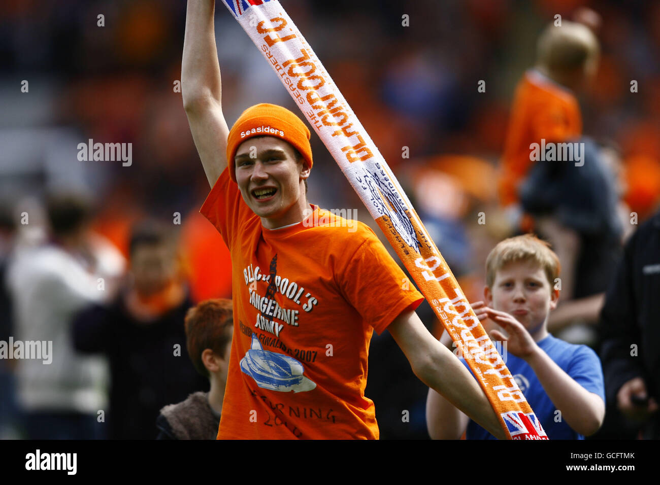Soccer - Coca-Cola Football League Championship - Blackpool v Bristol City - Bloomfield Road. Blackpool's fans celebrate reaching the playoffs against Bristol City Stock Photo