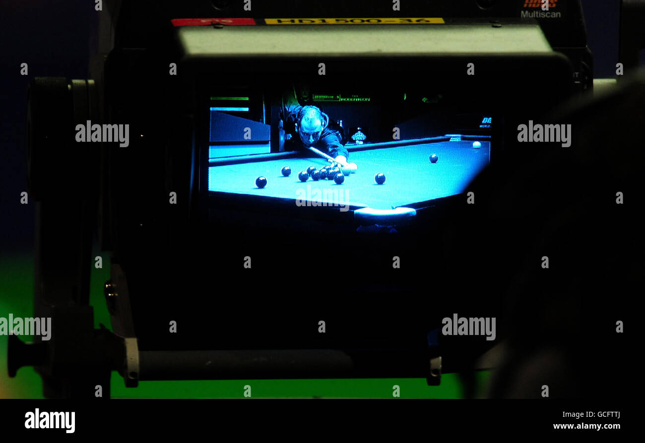 A general view of Scotland's Graeme Dott in a TV camera's viewfinder in action against Australia's Neil Robertson during the Final of the Betfred.com World Snooker Championships at the Crucible Theatre, Sheffield. Stock Photo