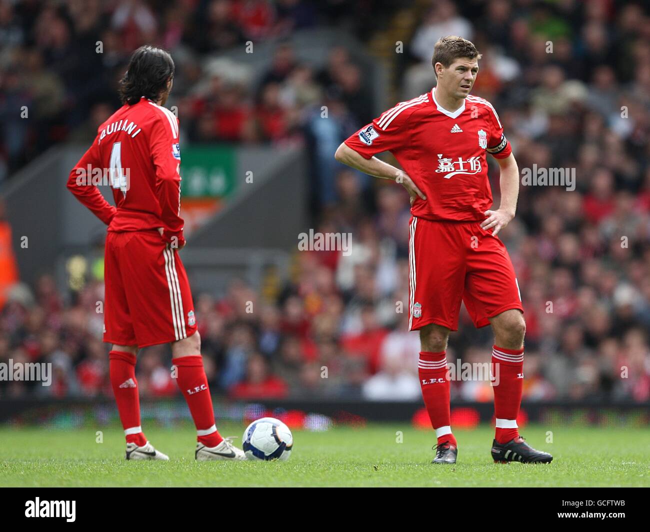 Liverpool's Steven Gerrard (right) and Alberto Aquilani (left) appear dejected as they preoare to kick off. Stock Photo