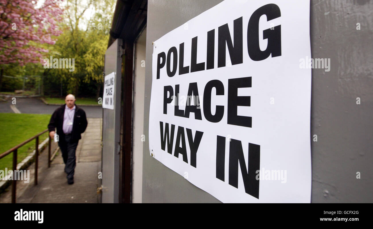 A member of the public arrives at Broomhouse Community Hall polling station in Glasgow as voters across the UK prepared to elect a new government. Stock Photo