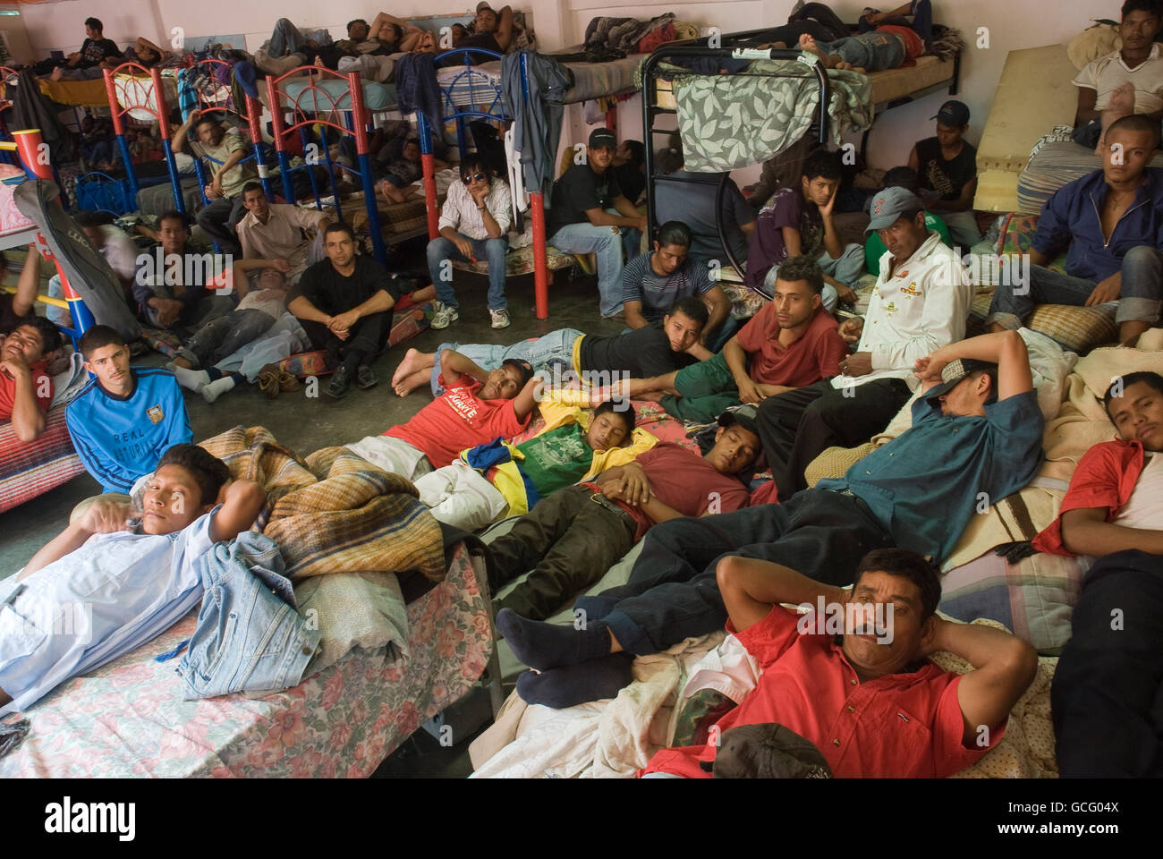 Central American migrants live together at a shelter in Tultitlan, Mexico in extremely overcrowded conditions. Stock Photo