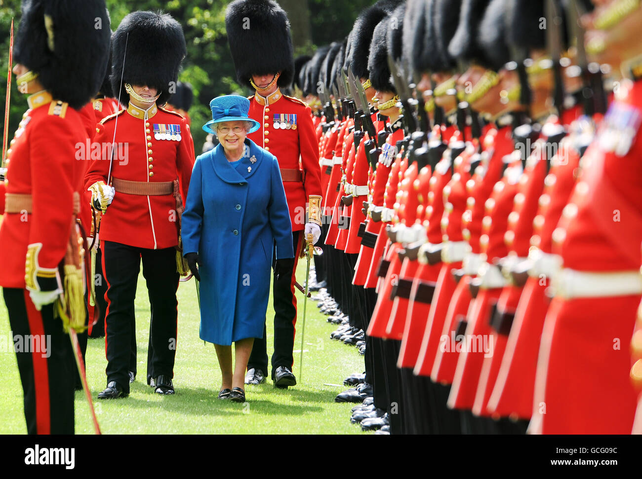Queen Elizabeth II inspects the Grenadier Guards before presenting