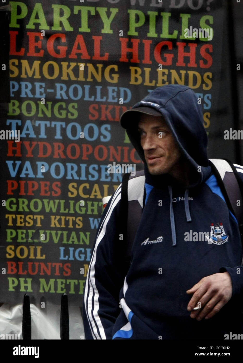 A man leaves the Nirvana Head Shop in Dublin, as owners of controversial shops were warned tonight the lucrative trade in once-legal highs was over, after a blanket ban on the most popular and lethal substances was enforced by the government a month earlier than expected. Stock Photo
