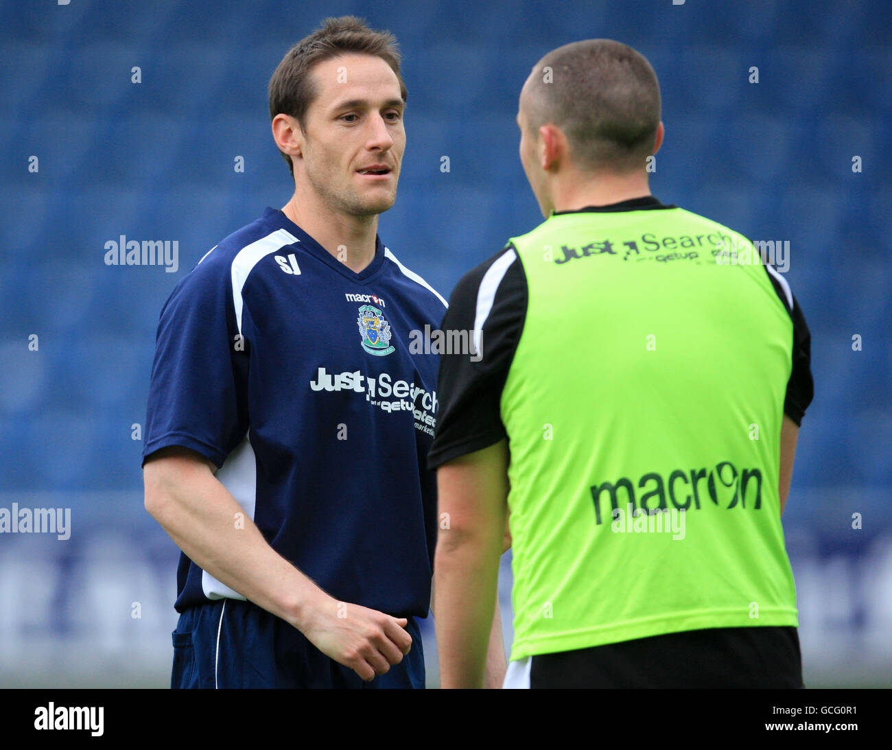 Football pre match warm up warming mid length half hires stock