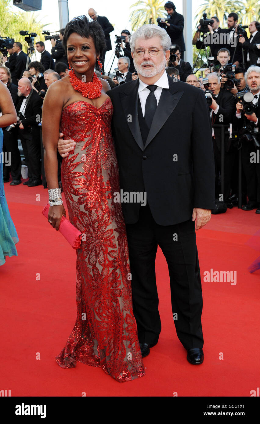 George Lucas and wife Mellody Hobson arrive for the screening of Wall Street: Money Never Sleeps at the Grand Auditorium Lumiere during the Cannes Film Festival, France. Stock Photo