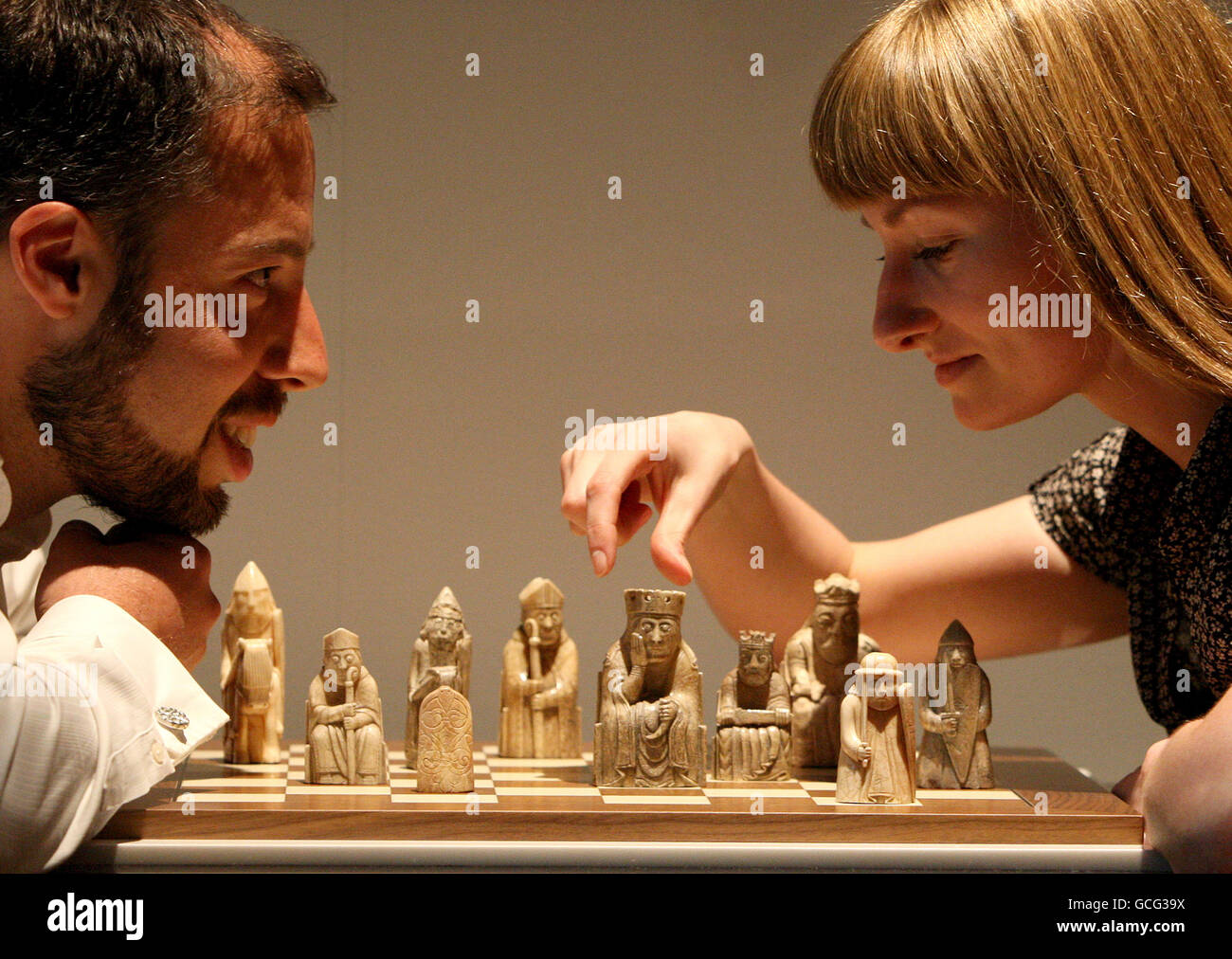 Assistant Curator for Scottish History at the National Museums Scotland, Lyndsay McGill, with Head of London and National Programmes at the British Museum, John Orna-Ornstein, with the Lewis Chessmen chess set at the National Museum of Scotland in Edinburgh. Stock Photo