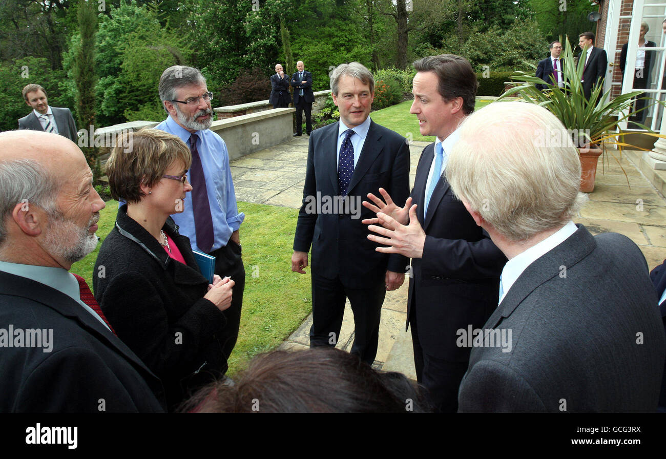 Prime Minister David Cameron Second Right With Secretary Of State For Northern Ireland Owen Paterson Centre And Sinn Fein President Gerry Adams Third Left At Stormont Castle In Belfast During Mr Cameron S