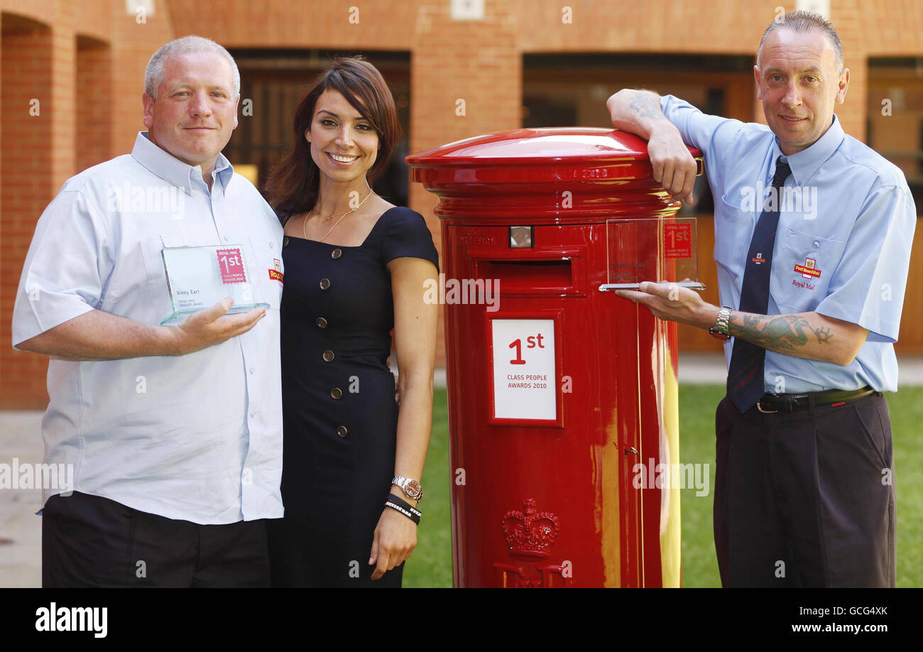 Vinny Earl from Droylsden in Lancashire (left) and Stephen Jones from Bangor in north Wales are joint winners of Royal Mail's National Bravery Award, which they received from BBC's One Show presenter Christine Bleakley at the Royal Mail's 1st Class People Awards at Haberdashers Hall in London. Stock Photo