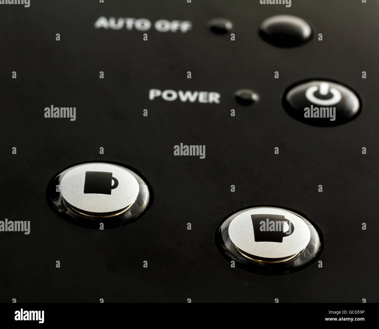Close up of buttons on single serve coffee and tea maker. Stock Photo