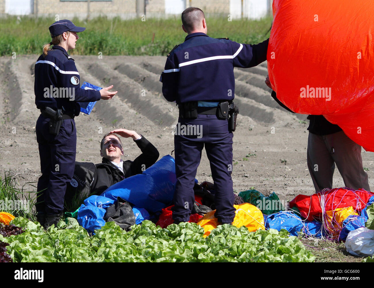Jonathan Trappe is questioned by French Police officers after landing