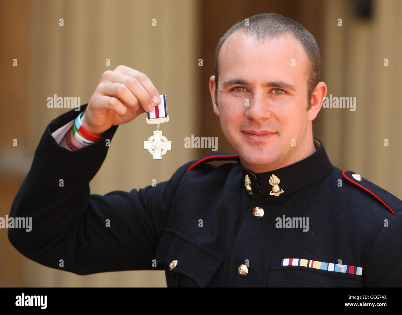 Gunner Steven Gadsby after he received his Conspicuous Gallantry Cross, from Britain's Queen Elizabeth II at Buckingham Palace, London. Stock Photo