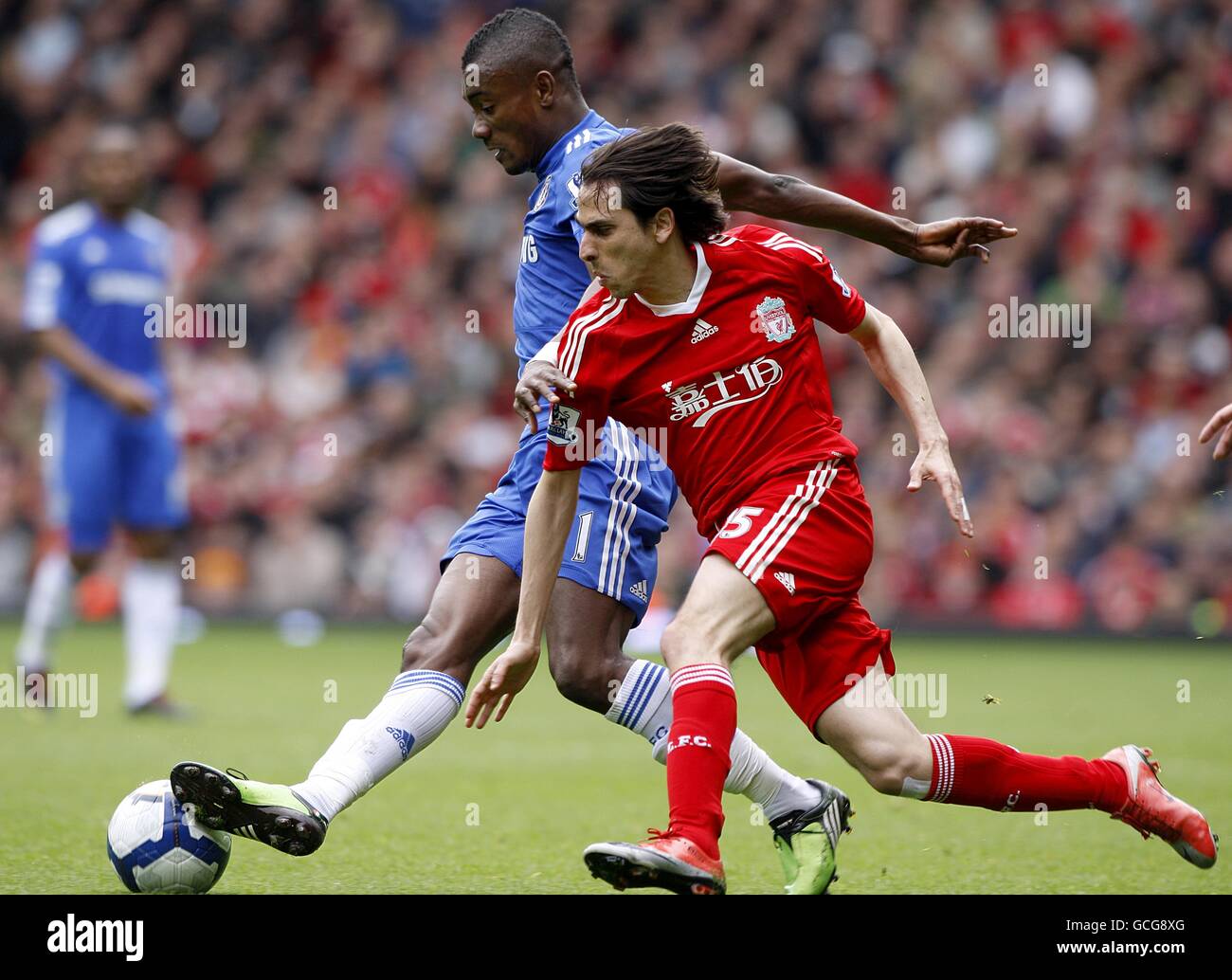 Soccer - Barclays Premier League - Liverpool v Chelsea - Anfield. Chelsea's Salomon Kalou (left) and Liverpool's Yossi Benayoun (right) battle for the ball Stock Photo
