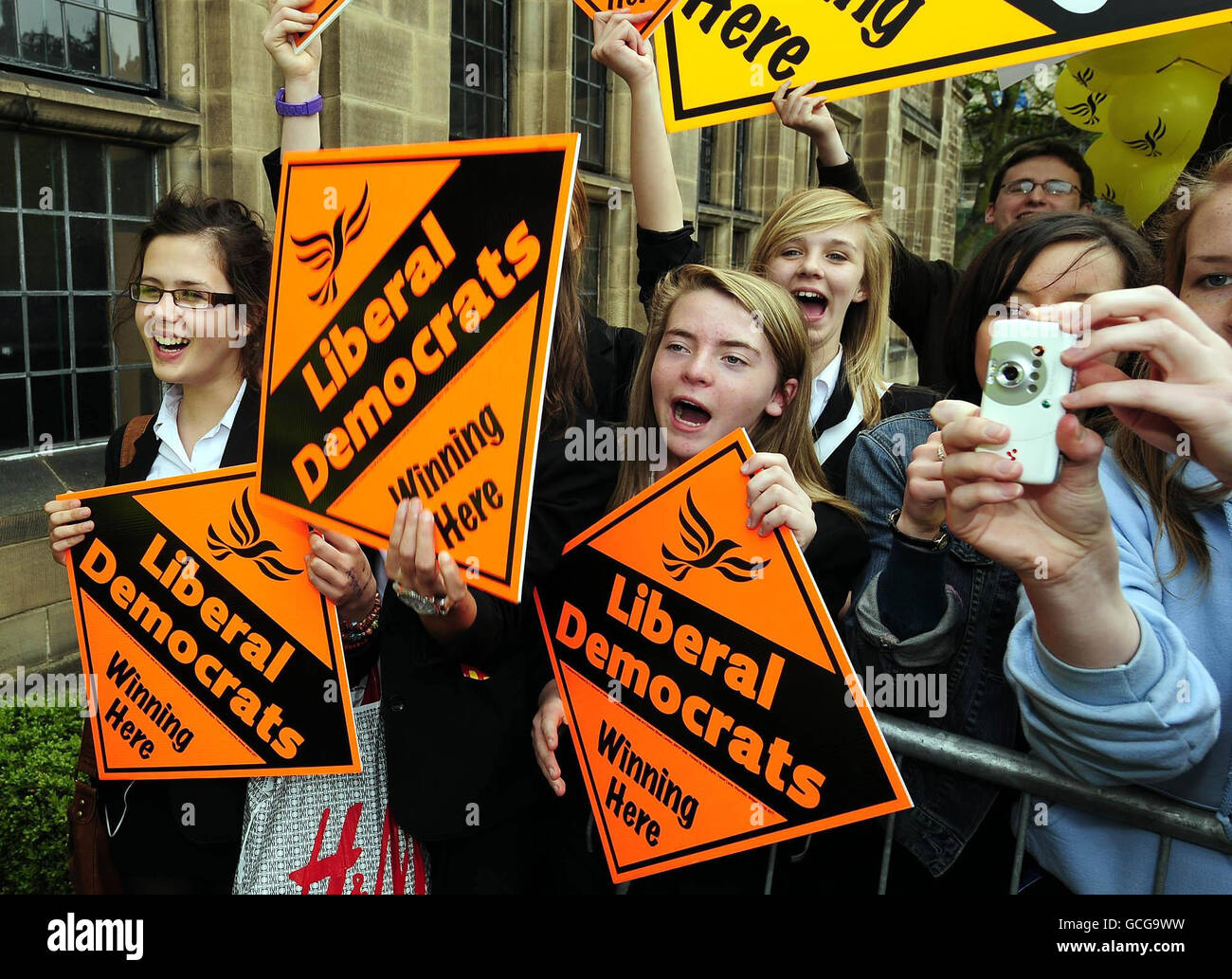 The Liberal Democrat Party leader Nick Clegg is cheered by young supporters as he arrives for a meeting with University students in Durham this afternoon. Stock Photo