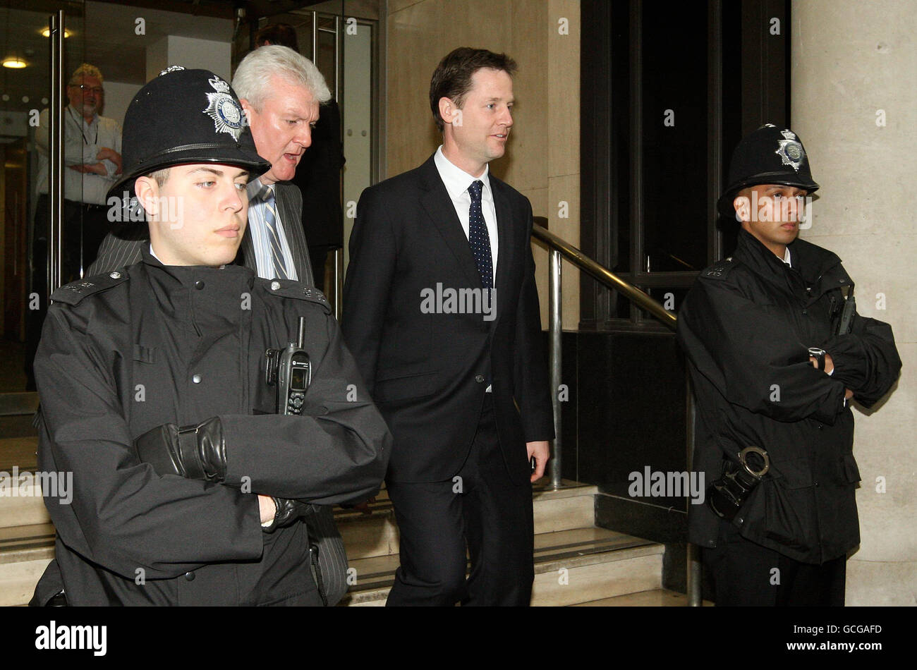 Liberal Democrat leader Nick Clegg leaves Local Government House in Smith Square, London, as the Liberal Democrat shadow cabinet hold talks following the general election result. Stock Photo