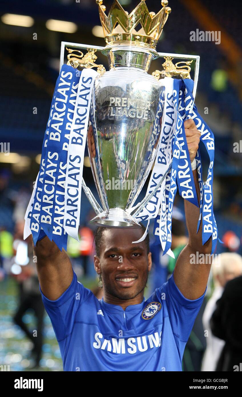 Chelsea's Didier Drogba celebrates with the Premier League trophy Stock