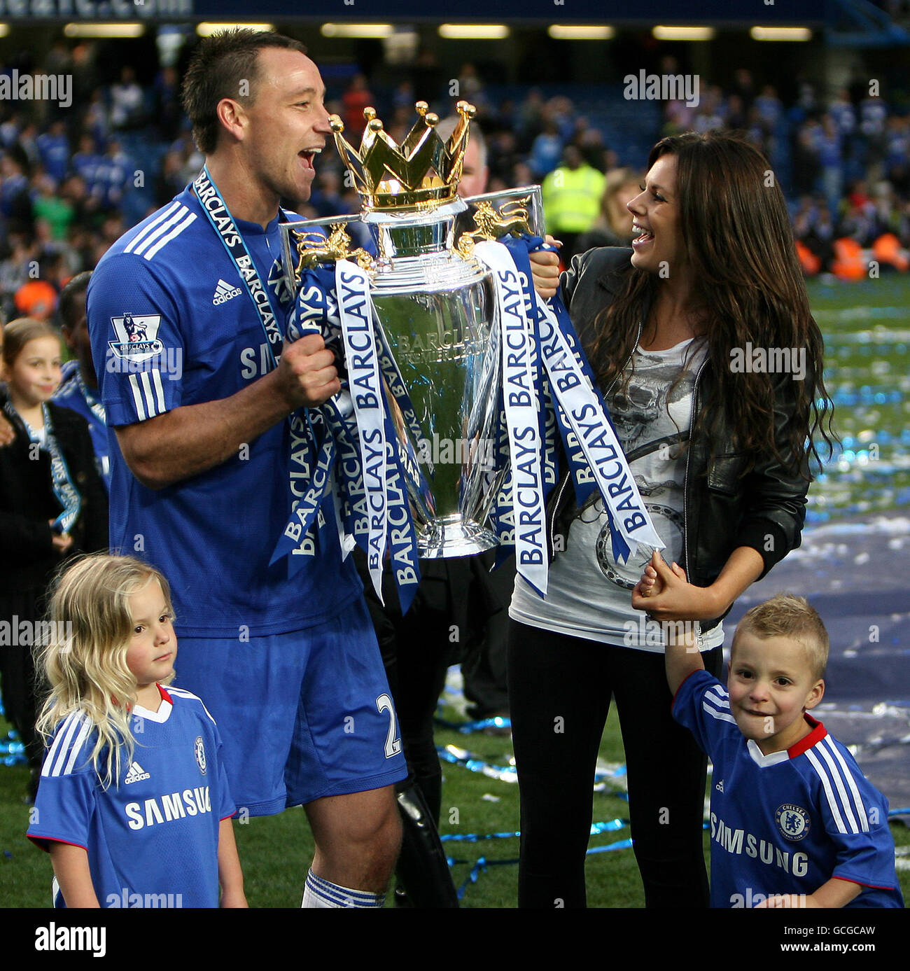Chelsea's John Terry celebrates with his wife Toni Poole and children after winning the Premier League trophy Stock Photo