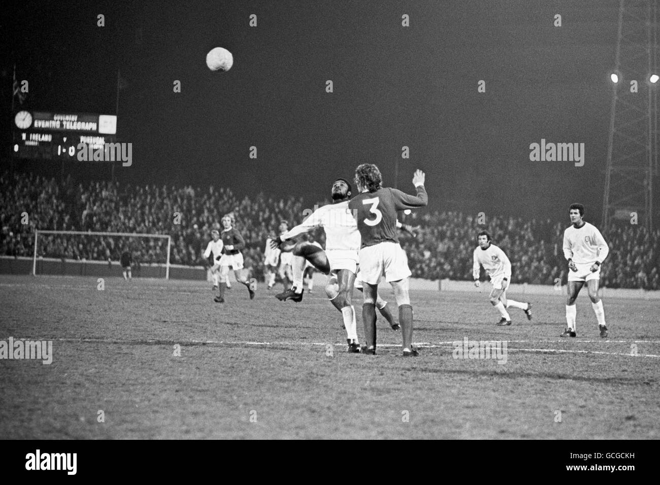 Eusebio in action for Portugal against Northern Ireland at Coventry City's Highfield Road Stadium. The game was moved from Northern Ireland due to The Troubles. The game finishes 1-1 with goals from Martin O'Neill and Eusebio. Stock Photo