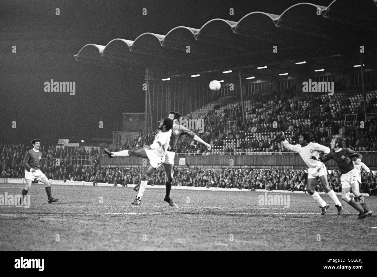 Eusebio in action for Portugal against Northern Ireland at Coventry City's Highfield Road Stadium. The game was moved from Northern Ireland due to The Troubles. Stock Photo