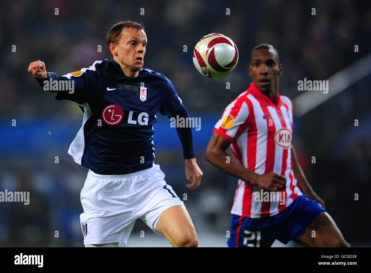 Atletico Madrid's Luis Amaranto Perea (right) and Fulham's Erik Nevland (left) battle for the ball Stock Photo