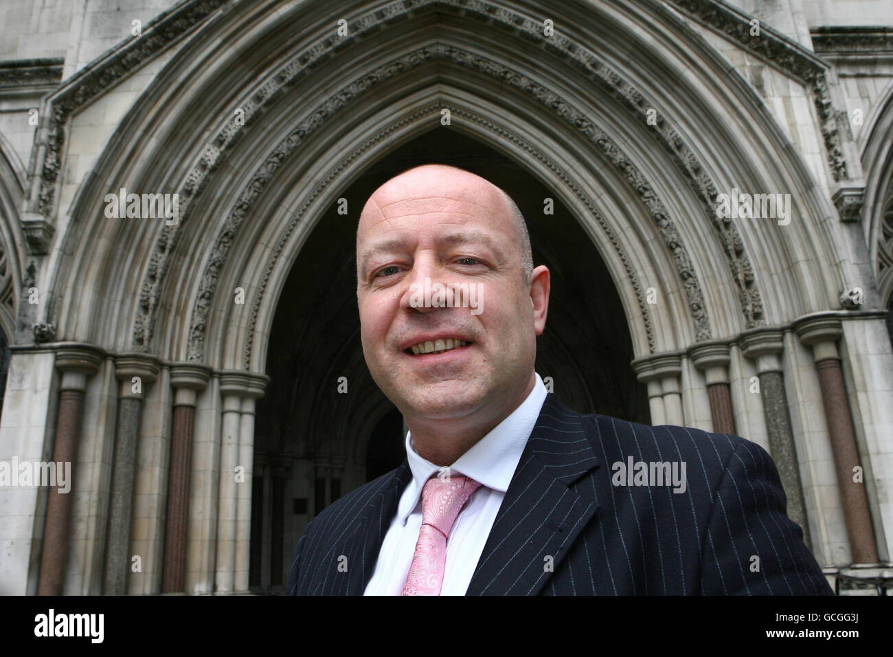 Neil Herron, from Sunderland, is photographed outside the Royal Courts of Justice in London, as