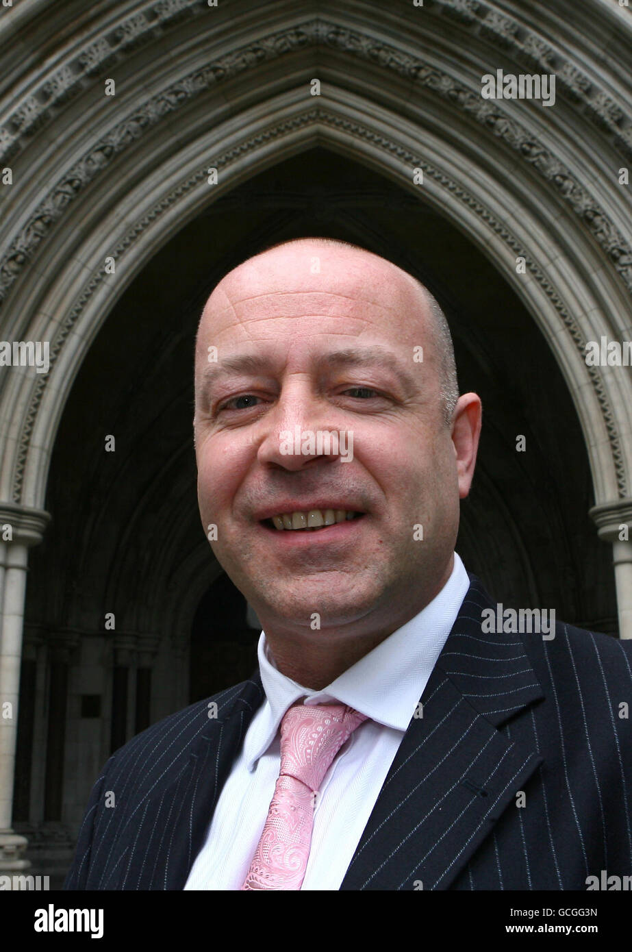 Neil Herron, from Sunderland, is photographed outside the Royal Courts of Justice in London, as