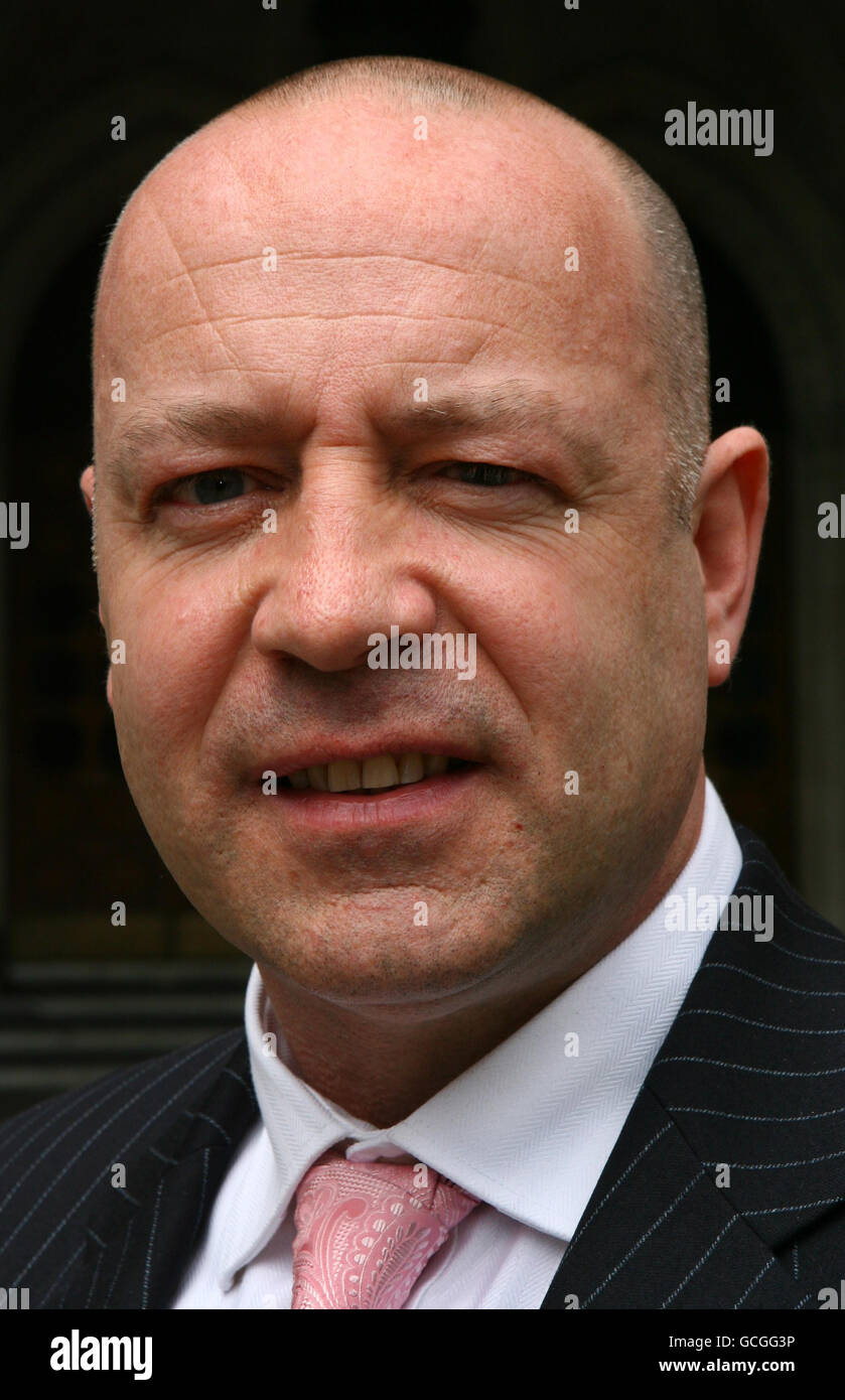 Neil Herron, from Sunderland, is photographed outside the Royal Courts of Justice in London, as