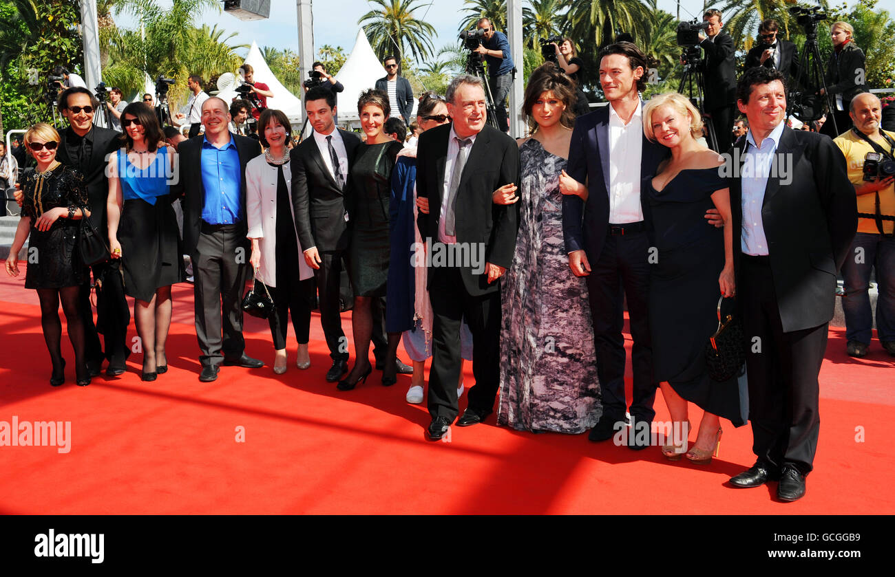 Director Stephen Frears (5th right), arrives with the cast of his new film, Tamara Drewe, and with others for its premiere at the 63rd Cannes Film Festival, France. The cast from left are, Luke Evans (left), Dominic Cooper, (centre left) with cartoonist Posy Simmonds, and Bill Camp (4th left) and Tamsin Greig (3rd left). PRESS ASSOCIATION Photo. Picture date: Tuesday May 18, 2010. See PA story SHOWBIZ Cannes. Photo credit should read: Fiona Hanson/PA Wire Stock Photo