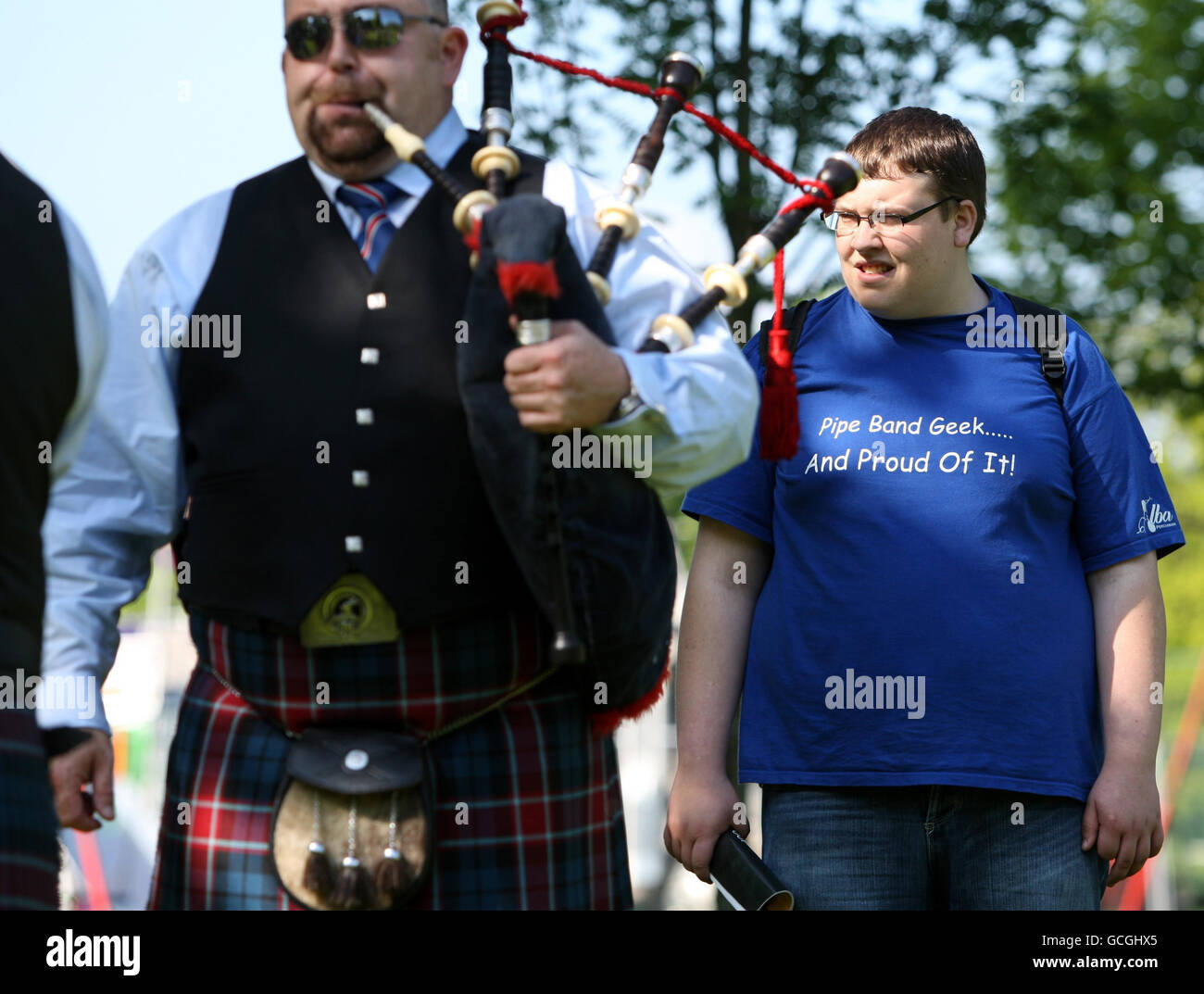 A member of the public watches the National Pipe Band Championships at