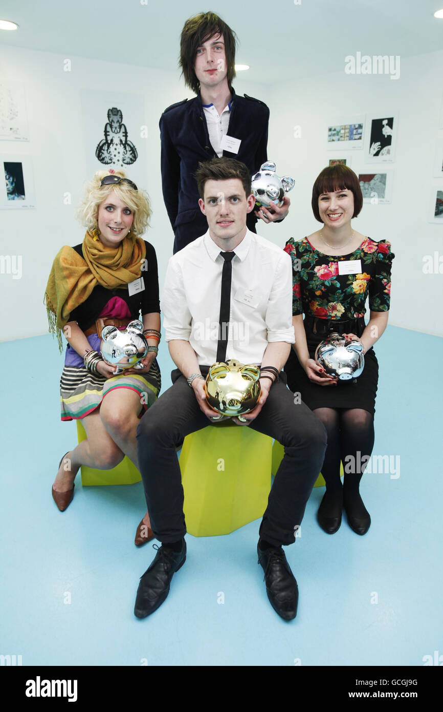 Winners of YouthNet's Lifesupport: Change through art competition at the Design Museum, London. (Left - right) Andrea Bowie Winner of the Film category, Chris Vickers Overall Winner (front), Connor Matheson (front) Photography Winner and Brigitte Sutherland Illustration Winner. Stock Photo