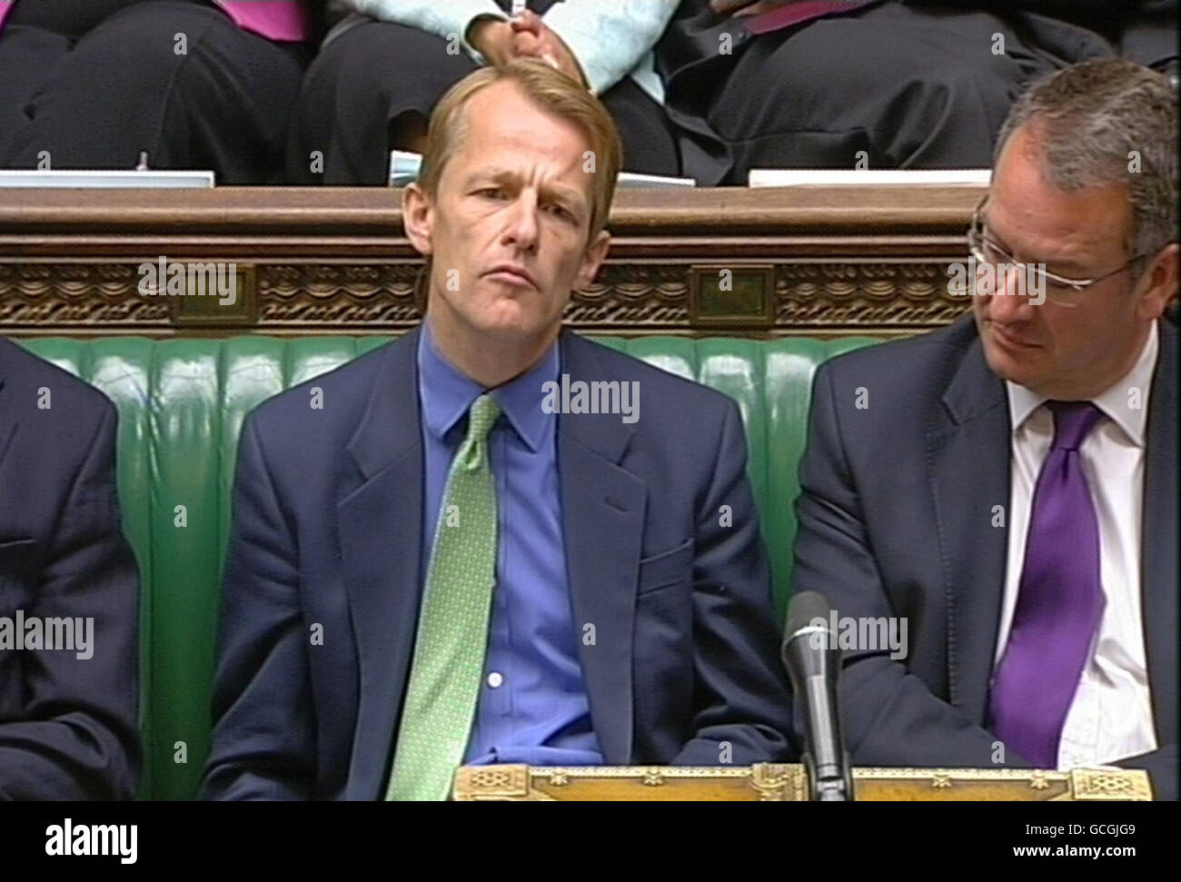 Chief Secretary to the Treasury David Laws listens to Shadow Chancellor Alistair Darling in the House of Commons, central London. Stock Photo