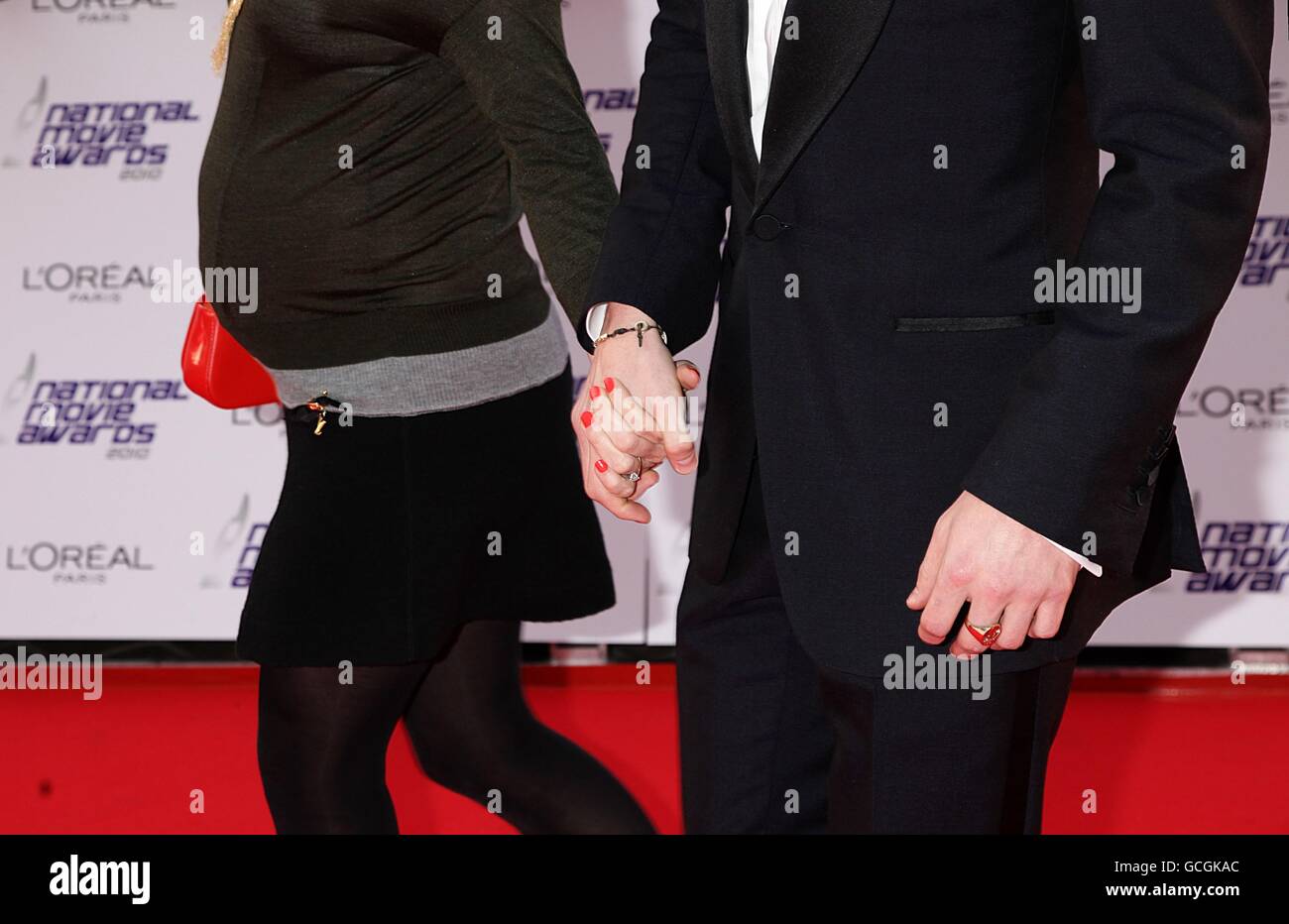 Sam Taylor-Wood and Aaron Johnson arriving for the 2010 National Movie Awards at the Royal Festival Hall, London. Stock Photo